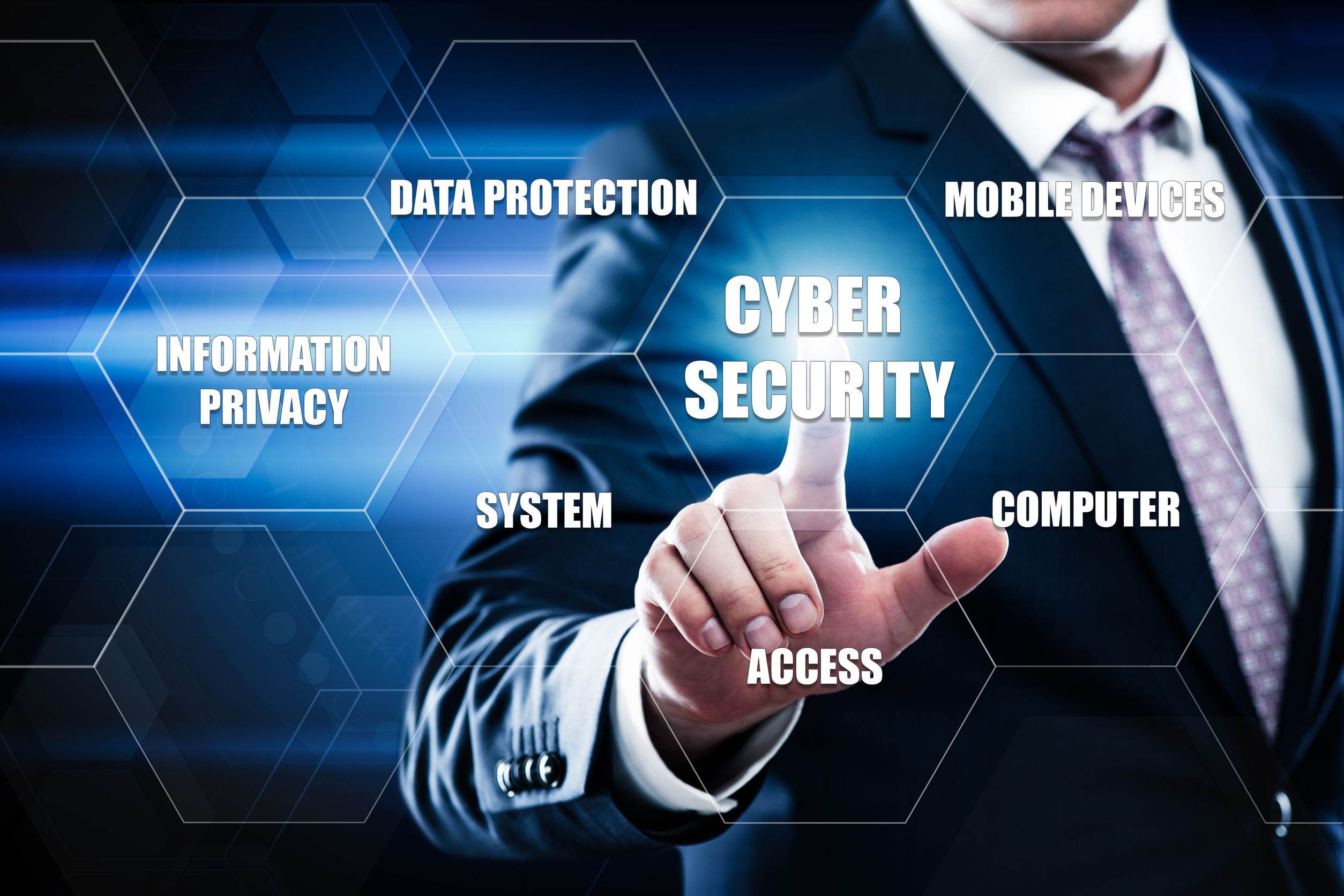 Man in suit pointing at Cybersecurity sign.